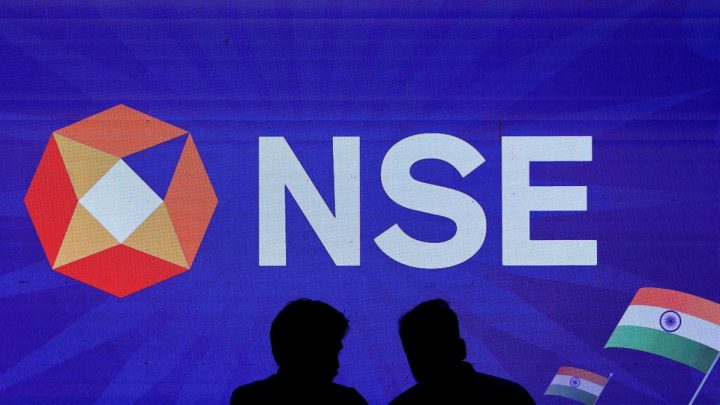 Stock markets trade marginally higher amid elevated crude oil prices