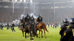 Fans and police injured in pitch invasion during ‘high risk’ German Cup tie