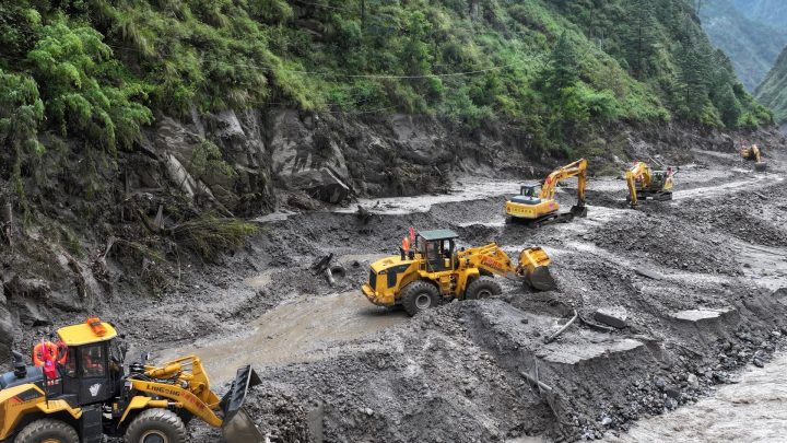 Nepal and China halt rescue efforts as border barrier lake overflows