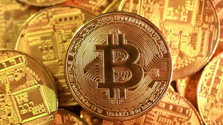 Bitcoin rises above $80,000 as soft dollar, debasement fears boost momentum