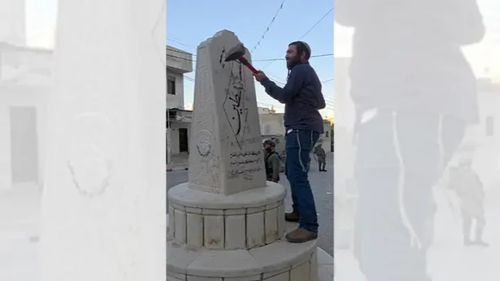 Israeli MP smashes West Bank memorial under army escort