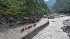 Two days on, rescuers scour debris in Nepal as risk of fresh flooding grows