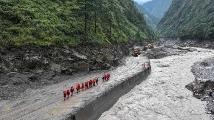 Two days on, rescuers scour debris in Nepal as risk of fresh flooding grows