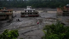 Number of missing in Nepal, China floods soars to nearly 3,000