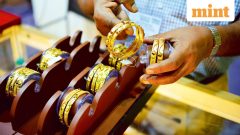 Gold, silver prices drop up to 1% as rising oil prices stoke rate hike fears