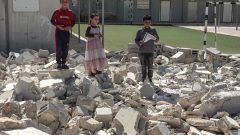 Palestinian children return to school under threat of Israel demolition