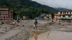 Rescuers search for survivors after devastating Nepal floods leave over 160 dead