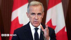 Trump says Canada wants 'benefits' of being US state as Carney says countries in trade war