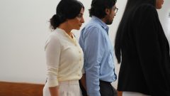 California couple confront their surrogate in a Texas court as dispute over newborn escalates