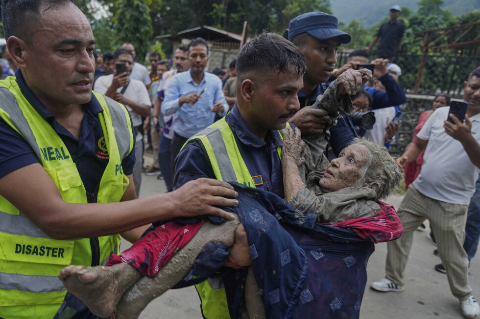 Catastrophic floods caused by a glacier collapse kill at least 273, with more than 1,300 missing