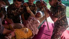 Death toll rises in Nepal-China border disaster as lake poses new flood threat