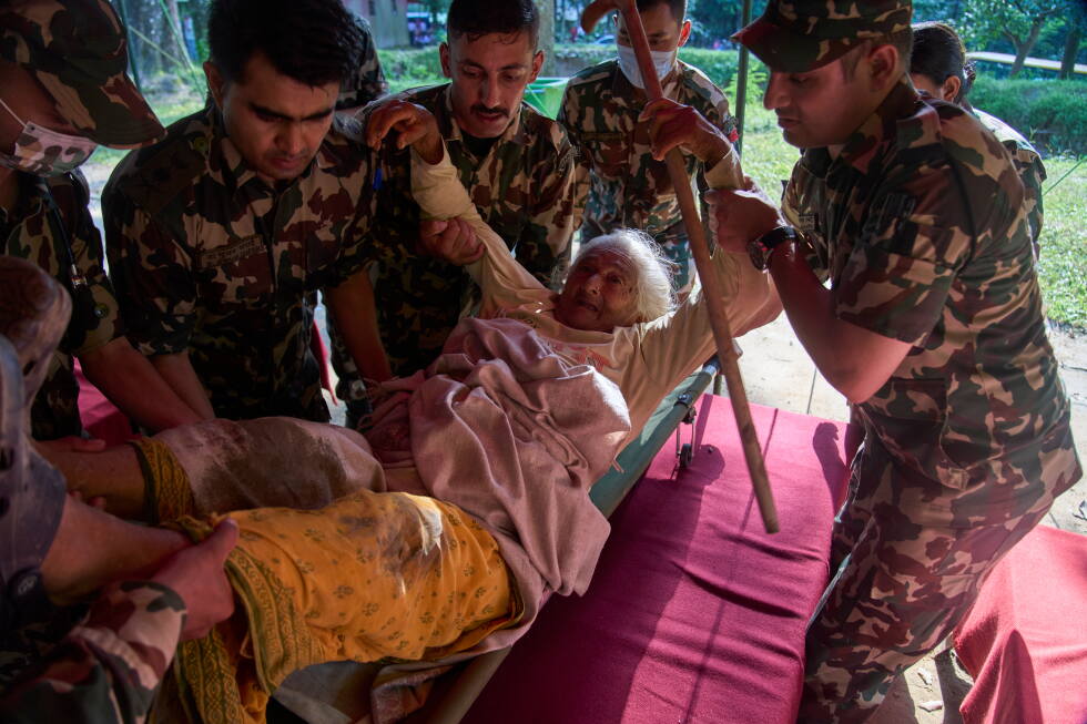 Death toll rises in Nepal-China border disaster as lake poses new flood threat