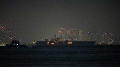 USS Abraham Lincoln sails past Singapore on its way home from Middle East