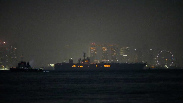 USS Abraham Lincoln sails past Singapore on its way home from Middle East