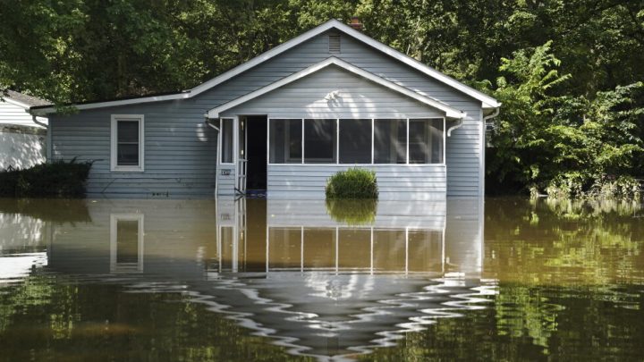 At least 7 people have died from days of heavy rain and record-setting flooding in Indiana