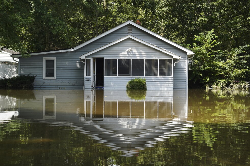At least 7 people have died from days of heavy rain and record-setting flooding in Indiana
