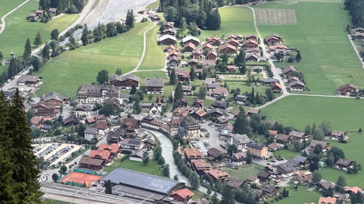 A looming rock collapse threatens a Swiss village as thawing permafrost destabilizes the Alps