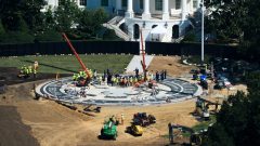 Trump plays White House tour guide to show off work on his helipad and ballroom