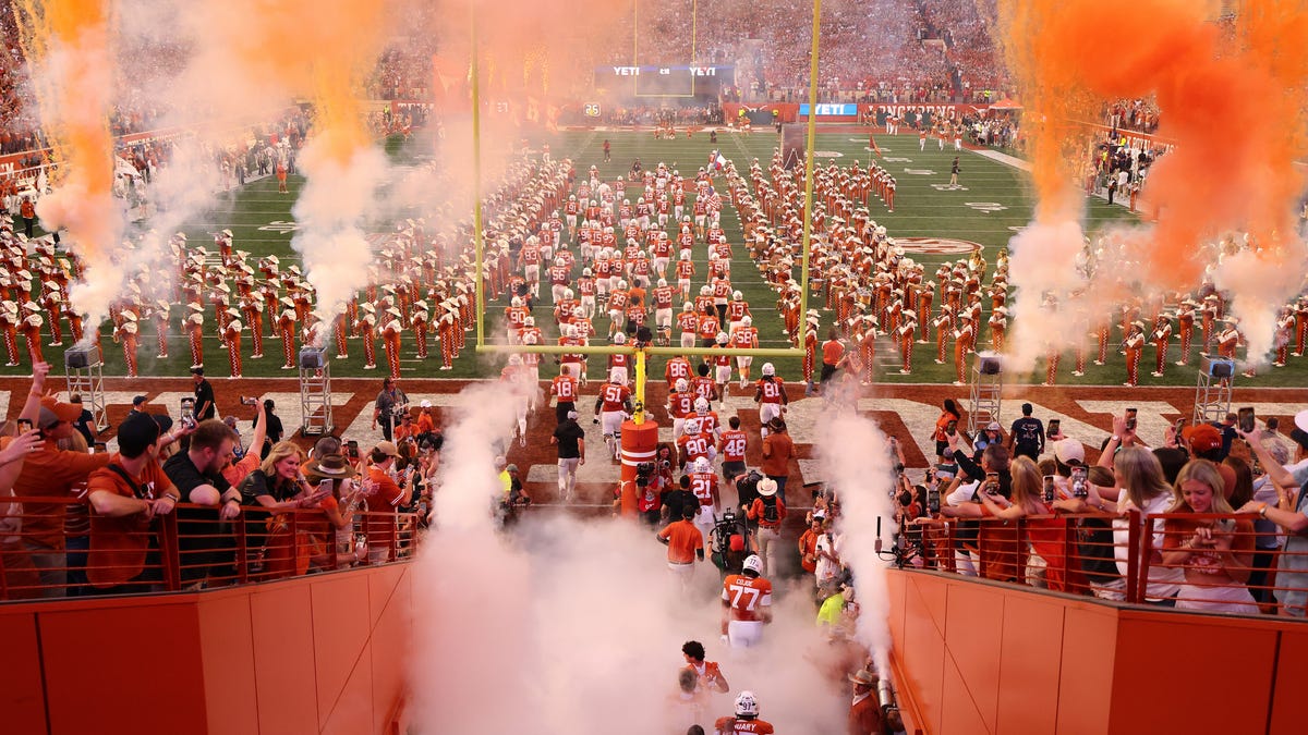 $50 million rosters. $5 million QBs. What it costs to build a college football contender