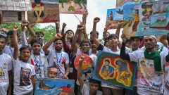 Photos: Rohingya refugees rally nine years after Myanmar exodus