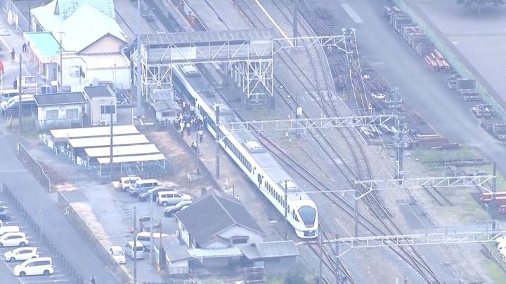 Four railway workers killed by express train at station in Japan