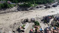 Deadly flash floods sweep through northern Nepal