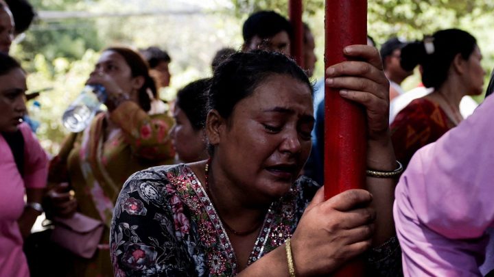 Nepal’s flood survivors search for missing loved ones