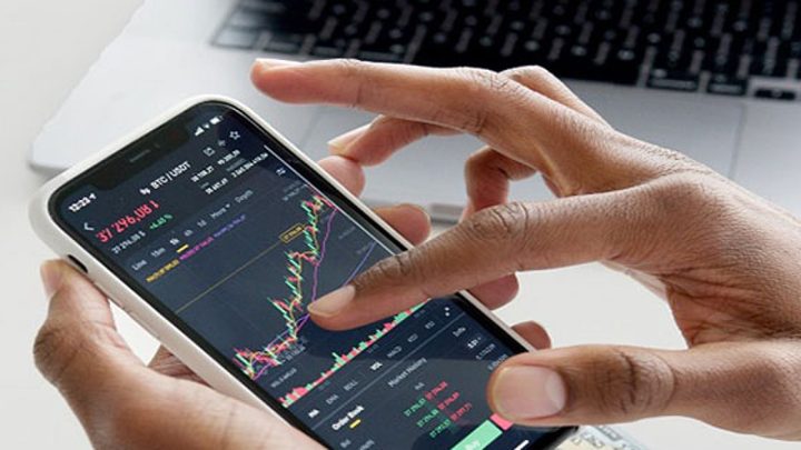 Stock markets trade marginally higher amid elevated crude oil prices