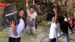 IndiaDehradun cave party: Men with large speaker dance inside Robber's Cave