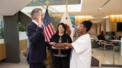 Oakland resident Tomiquia Moss leads California housing agency