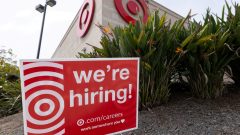 US adds jobs in August, beating economic forecasts