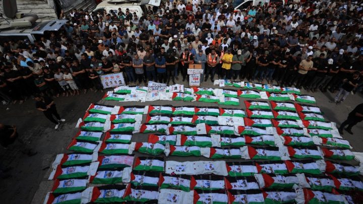 Palestinians mourn loved ones in mass funeral in Gaza City