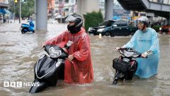 Bangkok roads submerged as flood disaster declared