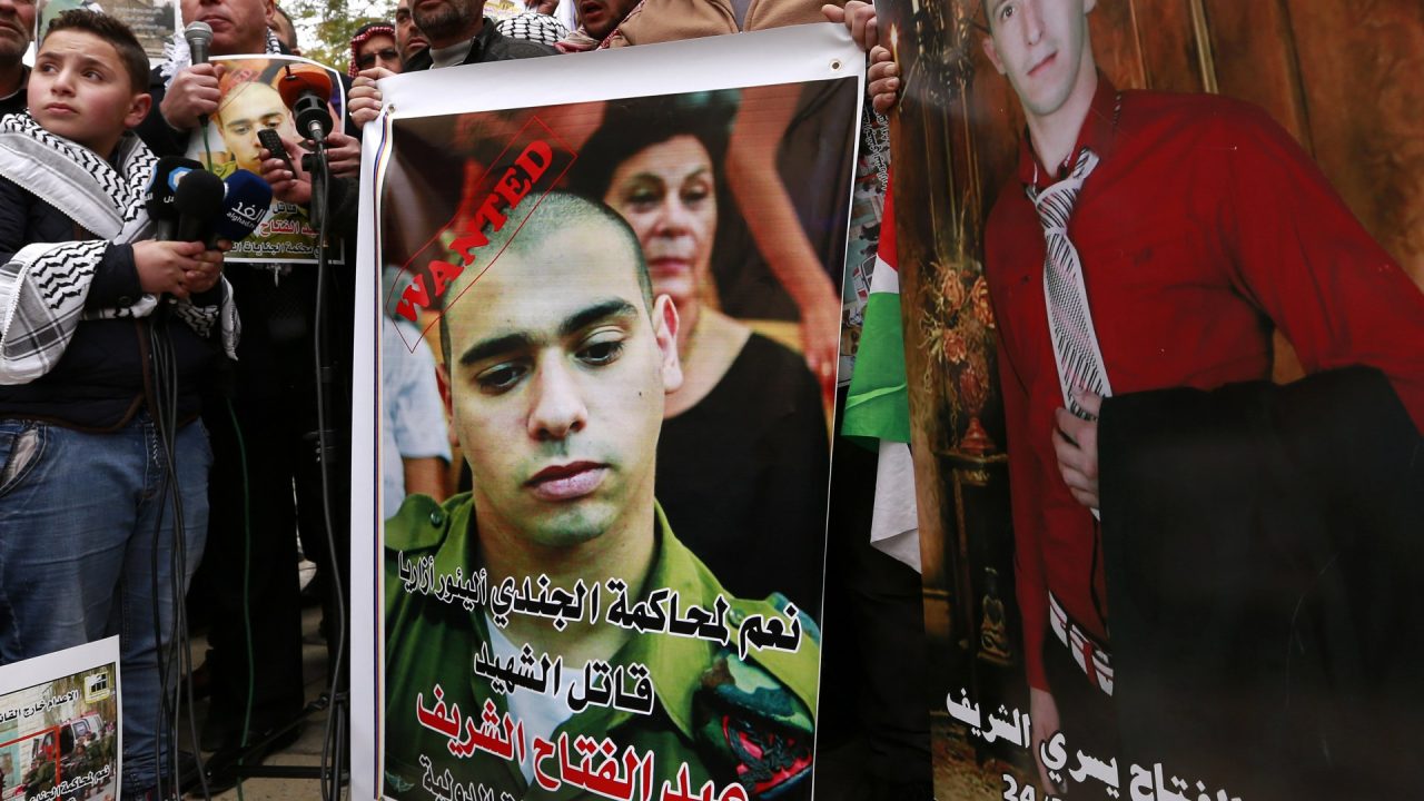 Israel’s president pardons soldier who killed wounded Palestinian in 2016
