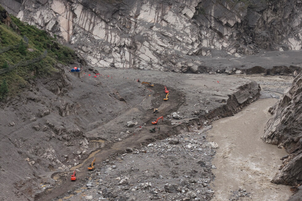 China exerts tight grip on information after floods along the border with Nepal