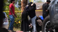 Parents of San Diego mosque gunman say a mental health facility failed to heed FBI warning