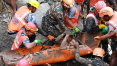 2 trapped workers pulled out alive from a hydropower tunnel 9 days after Nepal floods