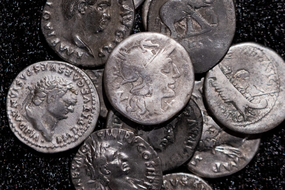 Amateur archaeologist finds Germany’s biggest hoard of ancient Roman silver coins