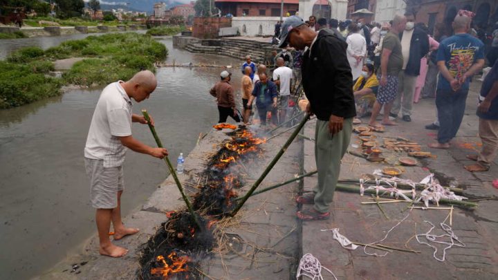 Symbolic funerals held in Nepal for those feared lost as some missing tourists make contact