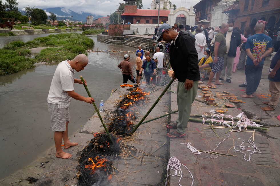 Symbolic funerals held in Nepal for those feared lost as some missing tourists make contact