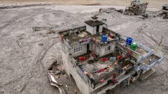 Rescuers in Nepal pull a Chinese national alive 10 days after floods