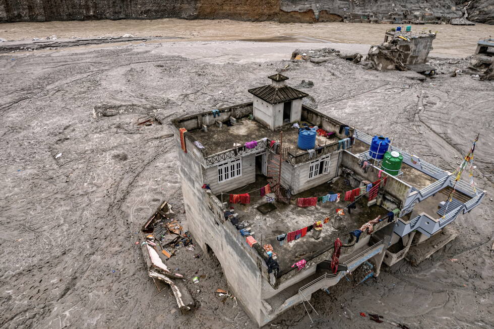 Rescuers in Nepal pull a Chinese national alive 10 days after floods