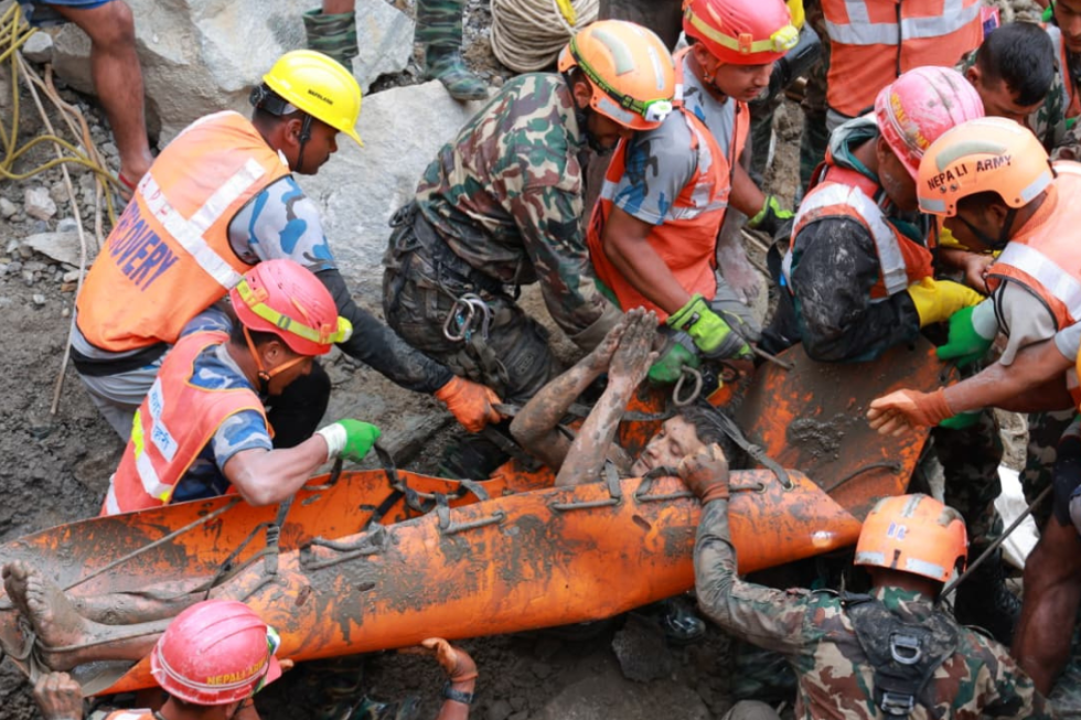2 trapped workers pulled out alive from a hydropower tunnel 9 days after Nepal floods