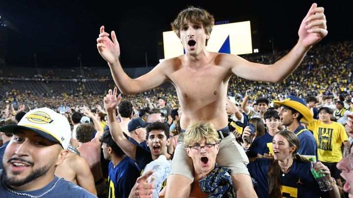 Michigan fans storm field after miracle Hail Mary TD vs Western Michigan