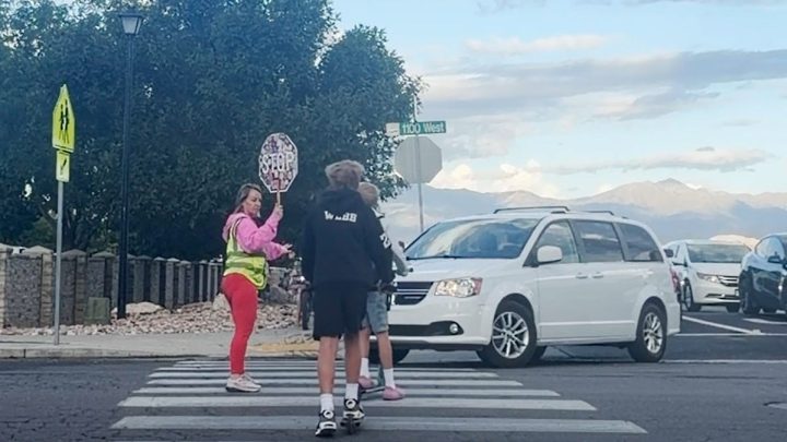 A car speeds toward children. This brave crossing guard didn’t hesitate.