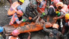 Photos: UN urges global aid after China, Nepal floods kill over 1,300