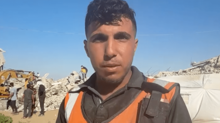 Gaza Civil Defence worker finds 21 relatives beneath rubble
