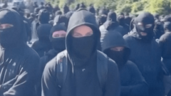‘Stop the boats’ masked protesters block England’s Port of Dover