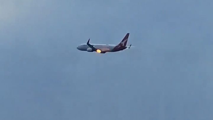 Flames burst from Qantas plane engine after New Zealand takeoff