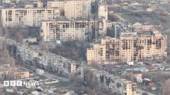 Risking their lives to find food and water in Russian-occupied city